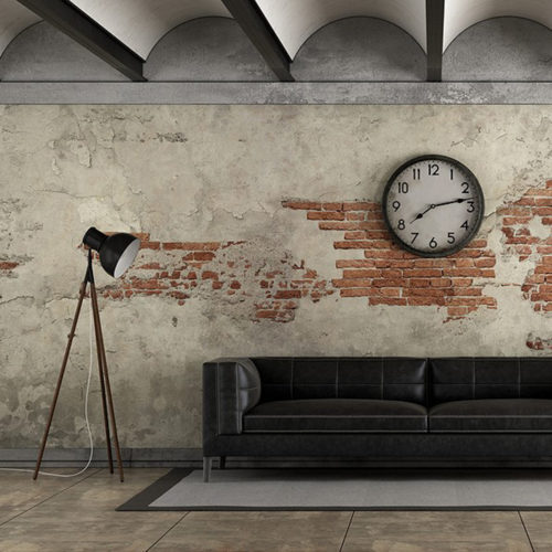 Black sofa in a grunge room with old brick wall - 3d rendering